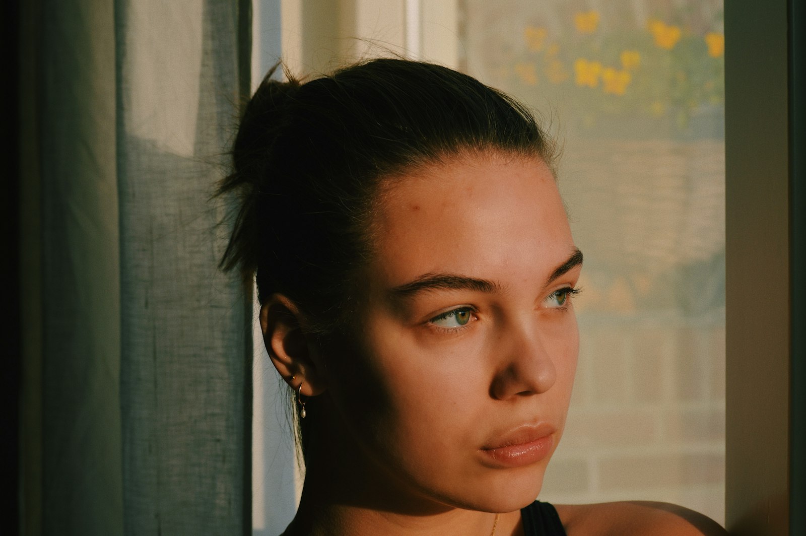Woman by a window in natural light